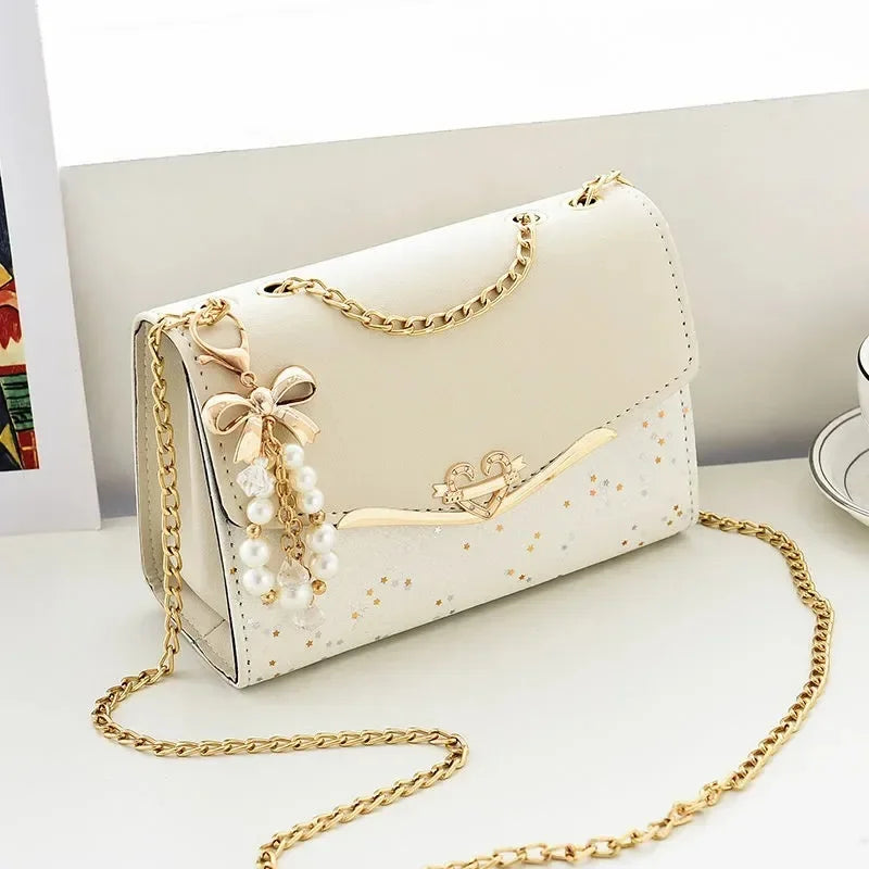 Kleine Mädchen-Taschen, One-Shoulder-Umhängetaschen, modische kleine Düfte, glänzende Lederketten, kleine quadratische Taschen